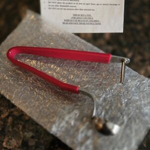 NIB - Avon Cherry and Olive Pitter